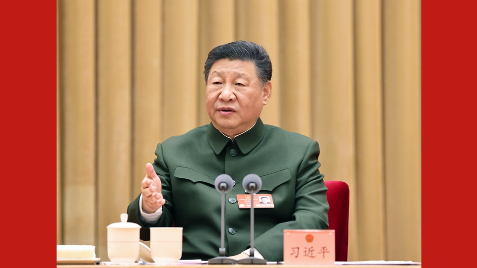 习近平出席解放军和武警部队代表团全体...